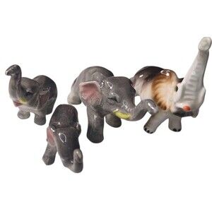 Vintage Ceramic Elephant Figurines Lot of 4 – Glazed Porcelain Miniatures, Trunk